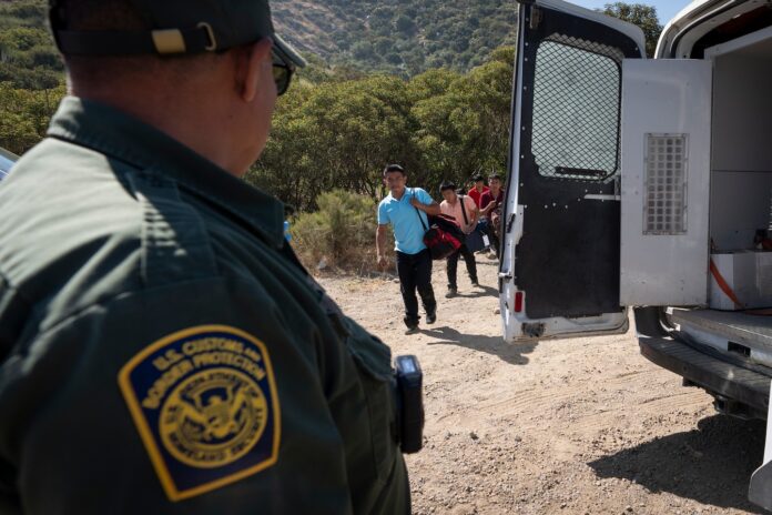 Border agents begin turning back migrants under new Biden restrictions